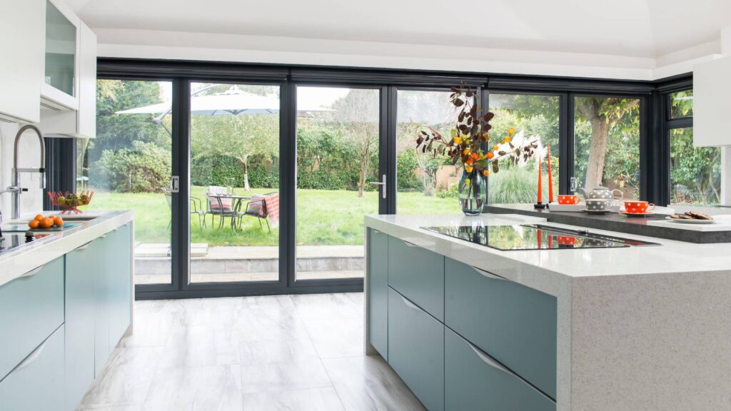 Sleek and stylish bi-folding doors connecting indoor and outdoor spaces.