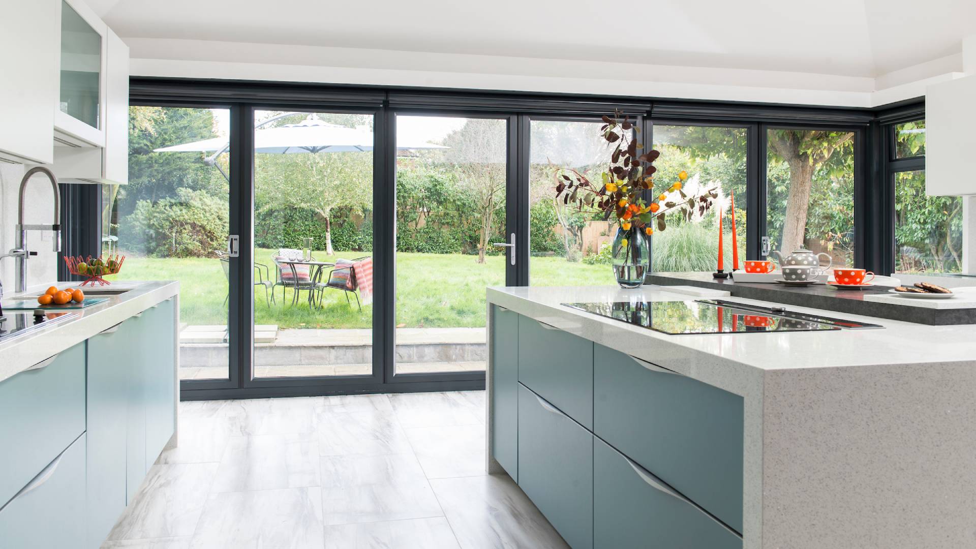 Sleek and stylish bi-folding doors connecting indoor and outdoor spaces.